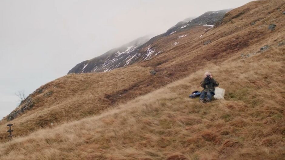 Ken Smith photographing filmmaker Lizzie MacKenzie during the BBC Hermit of Treig film about him