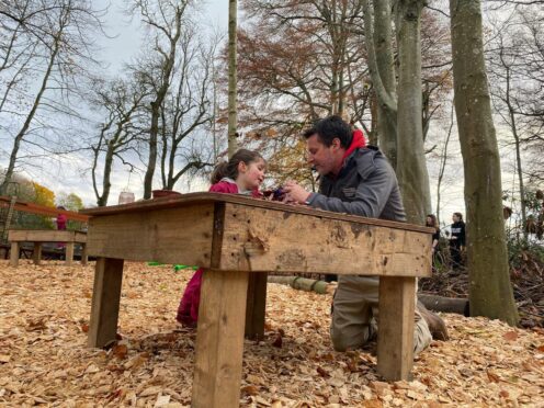 Layla, four, with Bruce Adamson at Haddo Kindy outdoor nursery