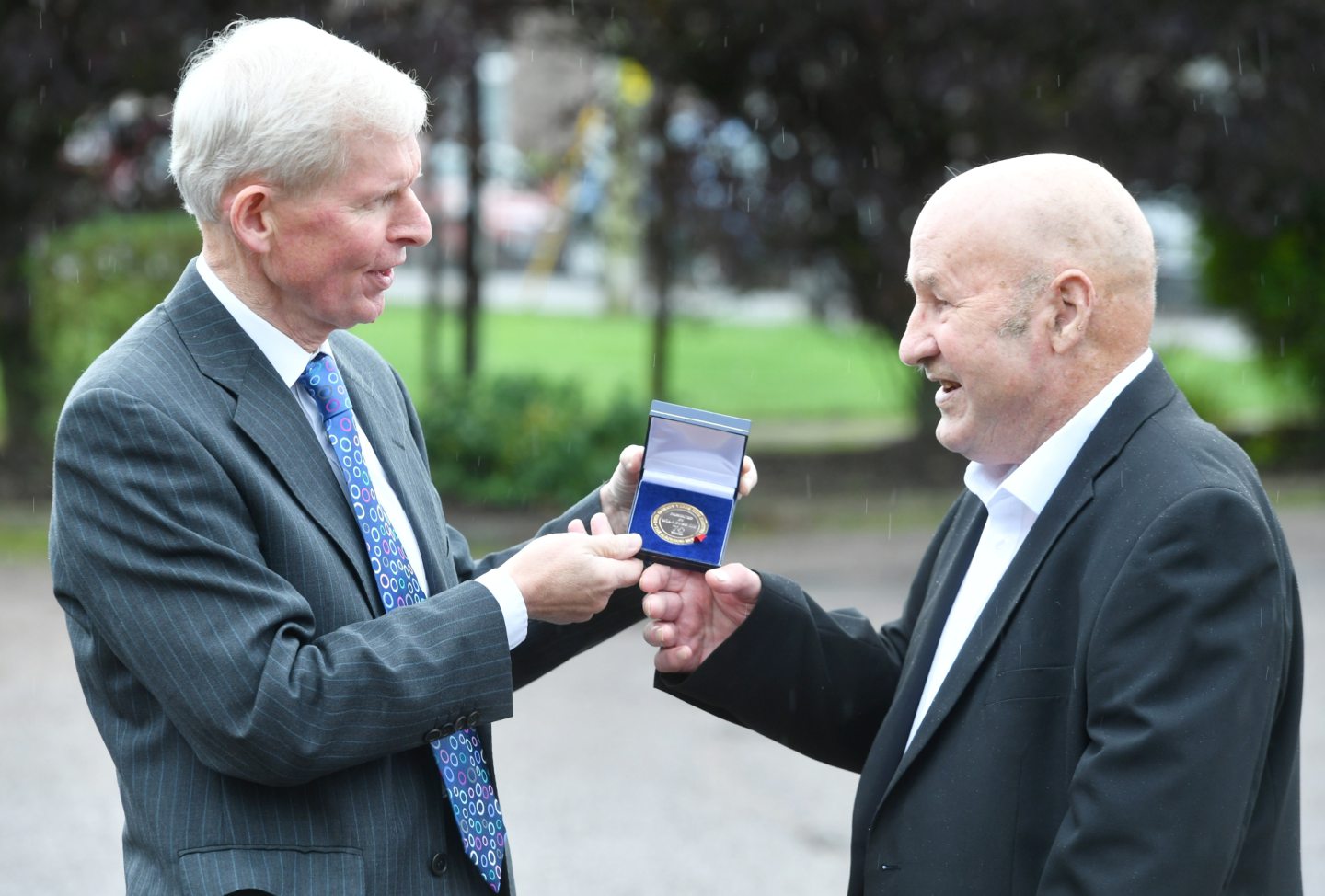 Joseph is pictured with Dr Ken McHardy who presented him with the medal at Inverbervie Health Centre.