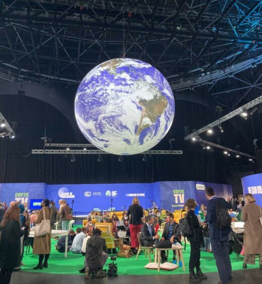 COP26 giant spinning globe suspended from the ceiling