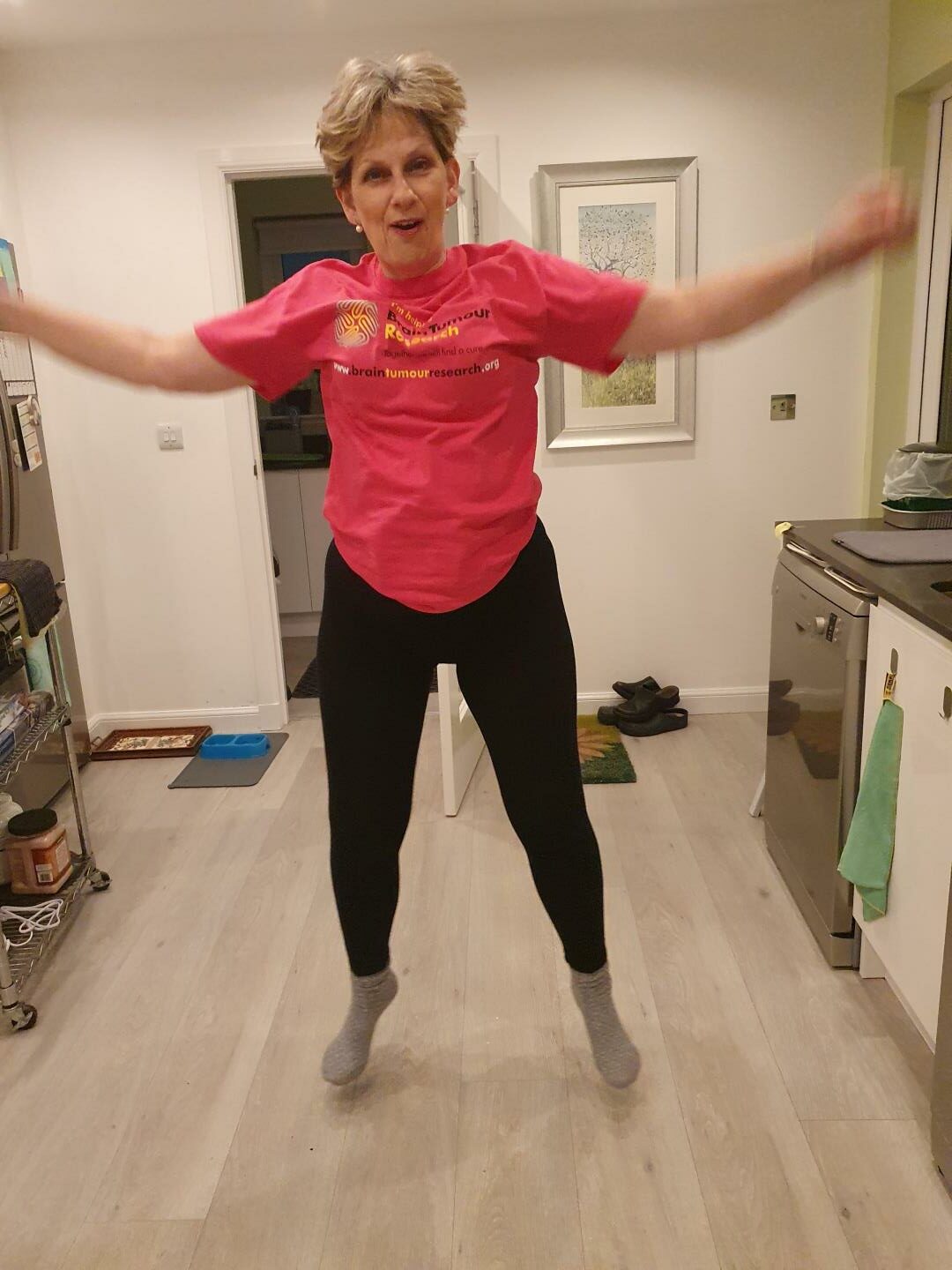 Deirdre, who was diagnosed with a brain tumour in 2008, practicing her star jumps.