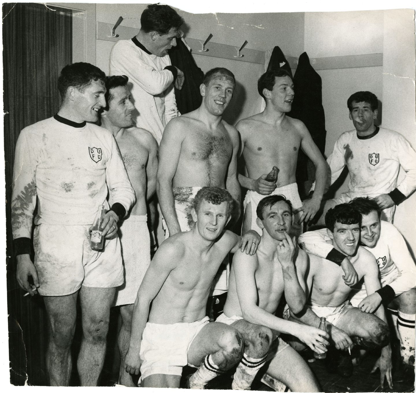 The United players celebrate victory against Barcelona at Tannadice.