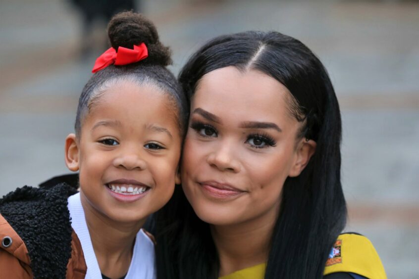 Georgia Davidson, 25, with her daughter Tianna, 5, graduating in Care Administration.