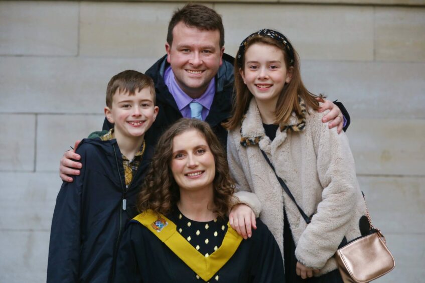 A proud Smith family from Arbroath. Melissa, graduating in social services, with her partner Steve and their children, Emily and Calvin.