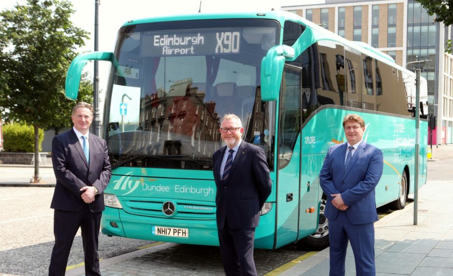 McGill's CEO Ralph Roberts, centre, with McGills buses chairman James Easdale, right, and his brother Sandy in Dundee.