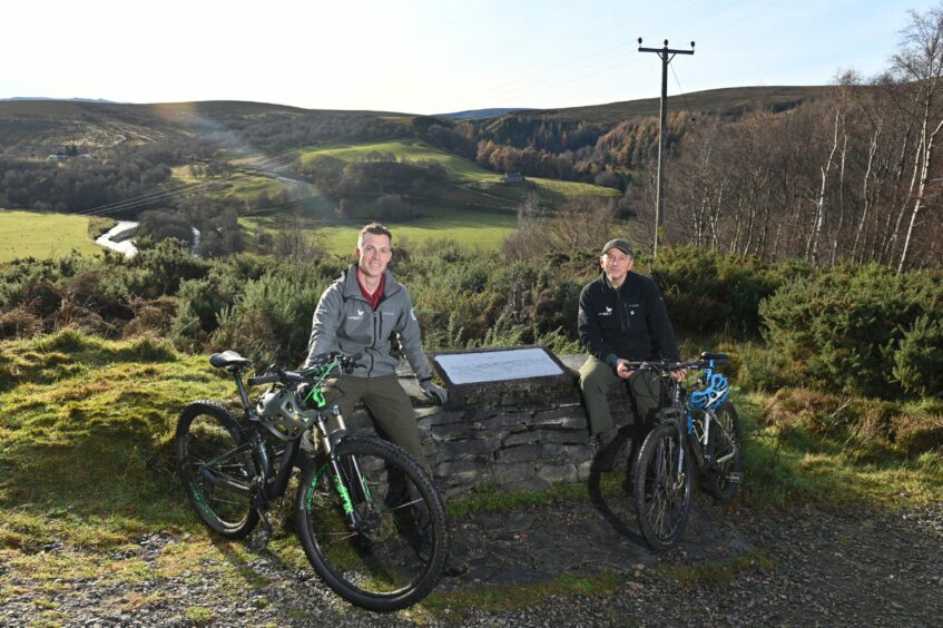 Pete Crane (head of visitor services, CNPA and ranger Pete Short with their bikes at Glen Avon. 