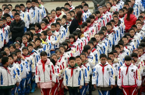Chinese pupils, some shown here lined up in rows, are the world's best,