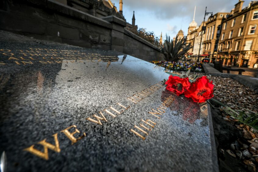 Poppies laid at the war memorial at City Churches, Dundee