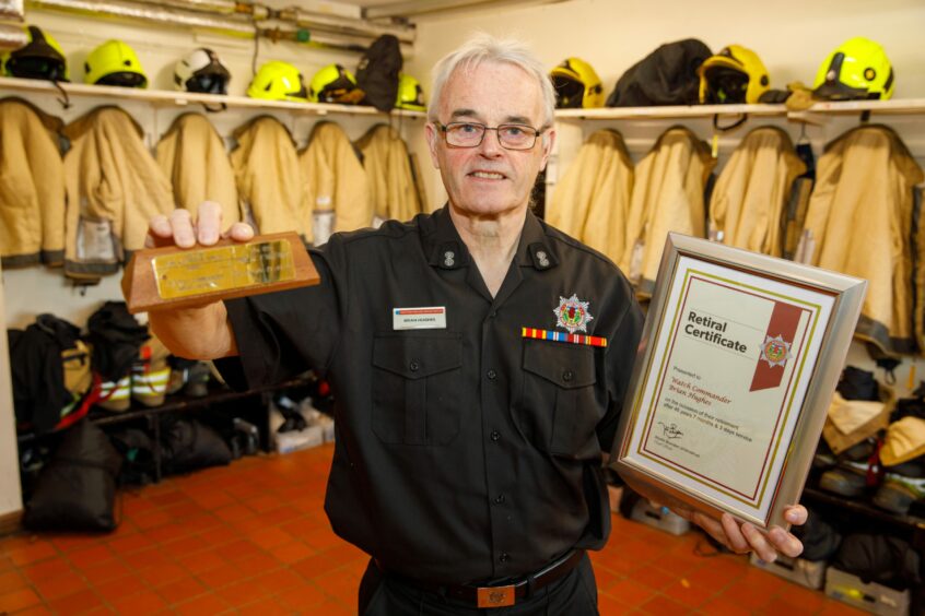 Fife retained firefighter Brian Hughes with his retiral gifts.
