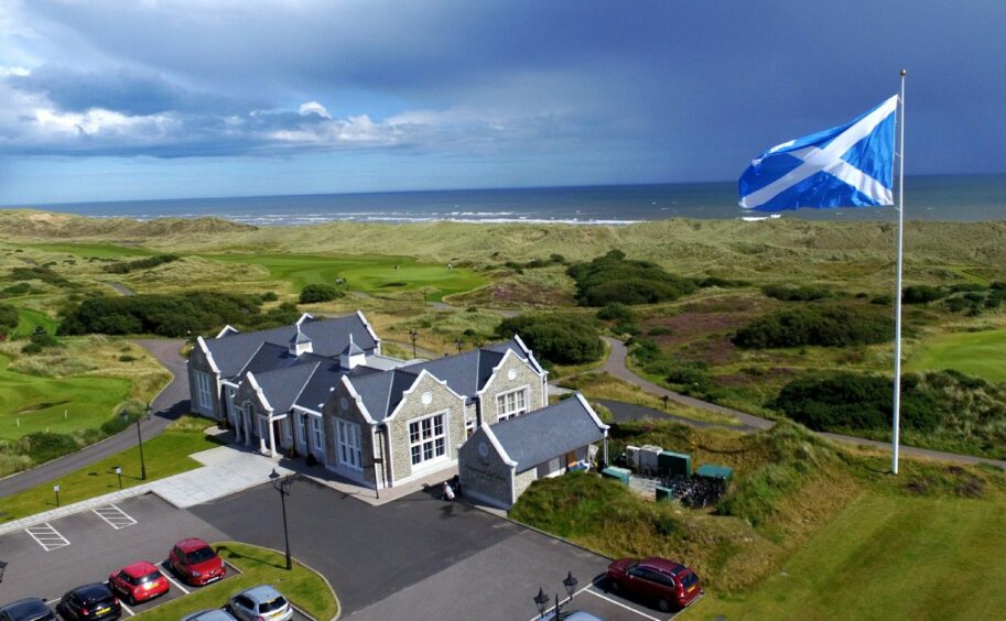 Aerial image of the clubhouse and course of Trump International Golf Links, Balmedie.