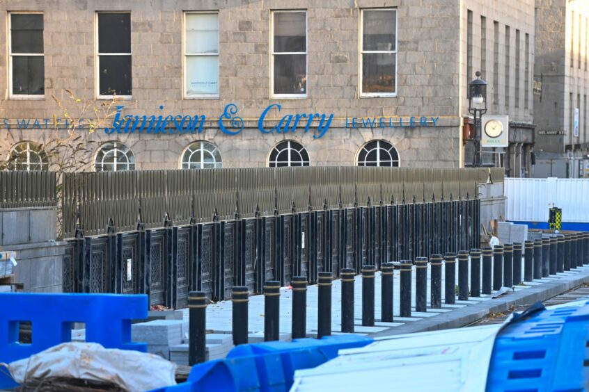 High winds afforded passers-by on Union Bridge a first look at new safety barriers installed after hoardings were blown over. Photo by Scott Baxter/DCT Media.