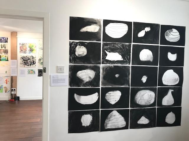 Charcoal drawings of different seashells by Kyle Primary School pupils on display at the Kaleidoscope community art exhibit..