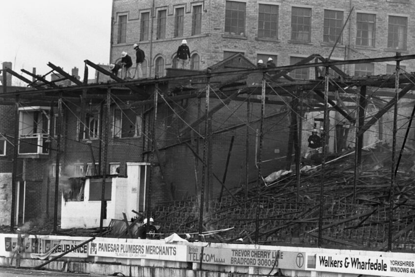 The burnt-out stand at Bradford's ground.