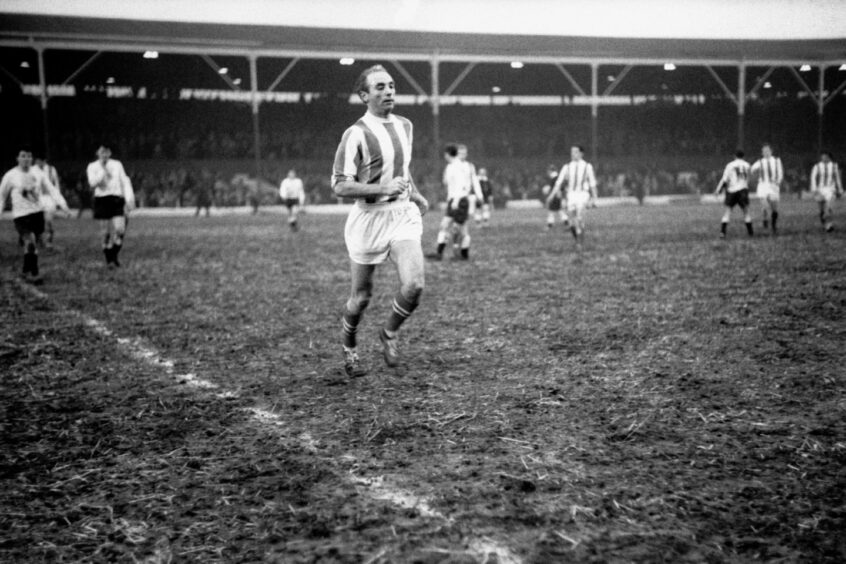 Stoke City's Stanley Matthews, aged 50 years and five days, sprints off the pitch at the final whistle