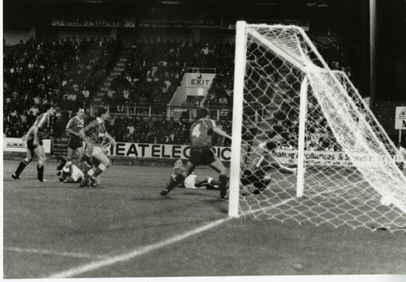 An action shot during the official opening match at St Johnstone FC's new ground when Manchester United came to town.