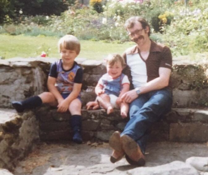 Colin Adamson at home in Aberchirder with his children Evan and Gillian.