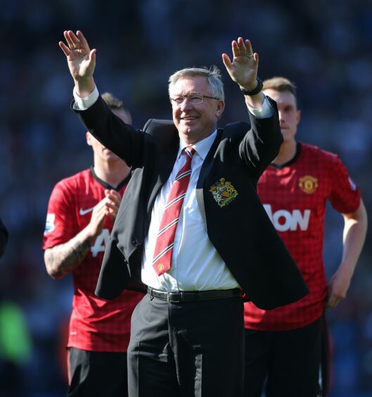 Alex ferguson saluting the fans after his final match in charge of Manchester United.
