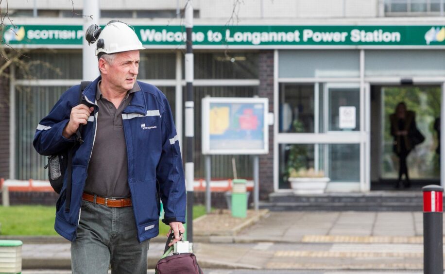 Workers leave Longannet Power Station in Fife for the last time.