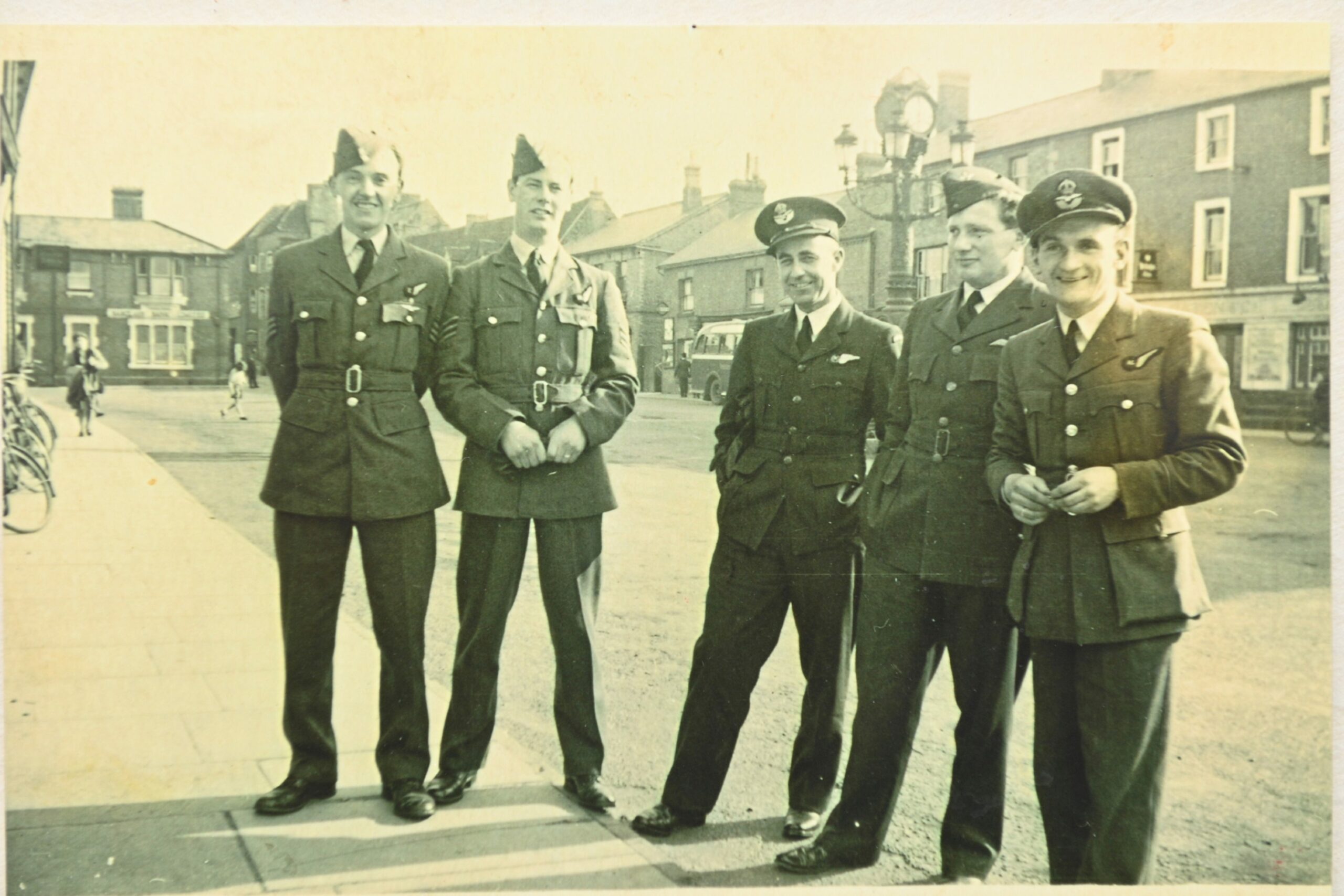 Bill, second from left, next to his mate Norman Piercy, with other air crew members.