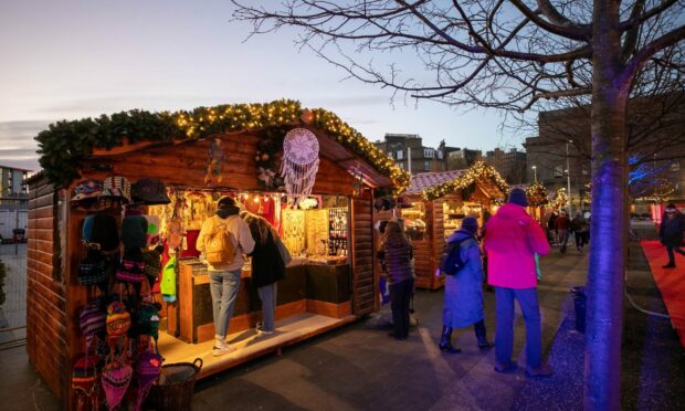 Stalls lit up at the 2021 Dundee Christmas market
