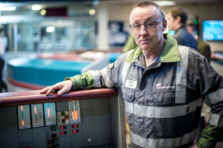 A workforce of just over 200 worked their last shifts at the site on the March 24 2016. Pictured at a console is Bobby Smart, then 59, from Kincardine, had worked at the plant since he was 19.