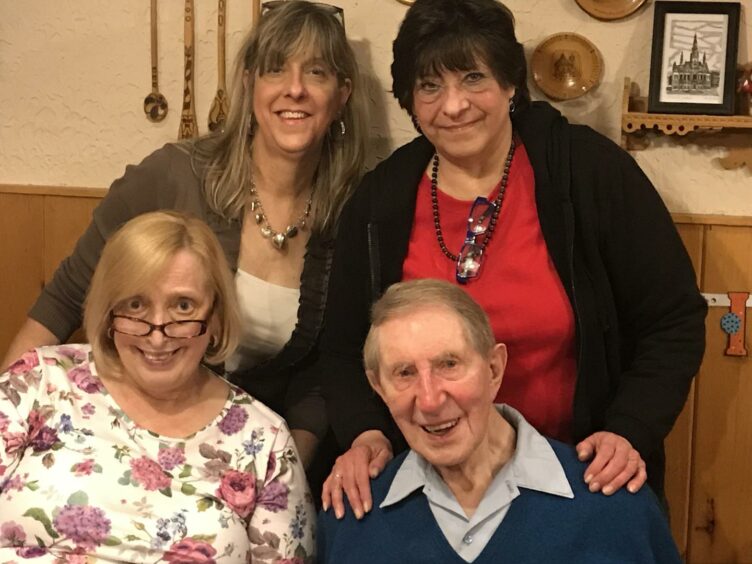 Mr Mitchell on his 90th birthday with his three lassies, Sharon Walker, standing left, Diana Walker-Smith, and Eileen Lackland, seated.