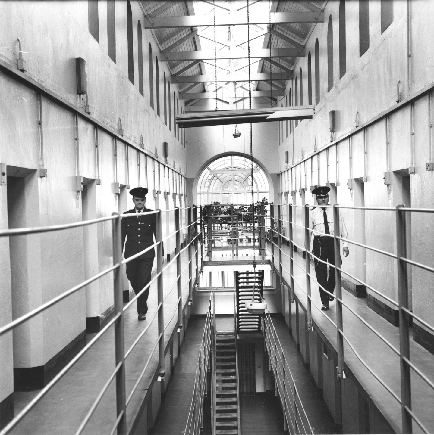 Guards walking in a corridor at Peterhead Prison