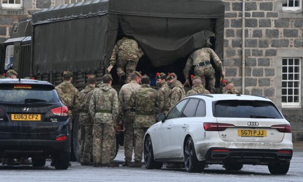 Military personnel arriving in Aberdeen to support Aberdeenshire communities with power cuts. 