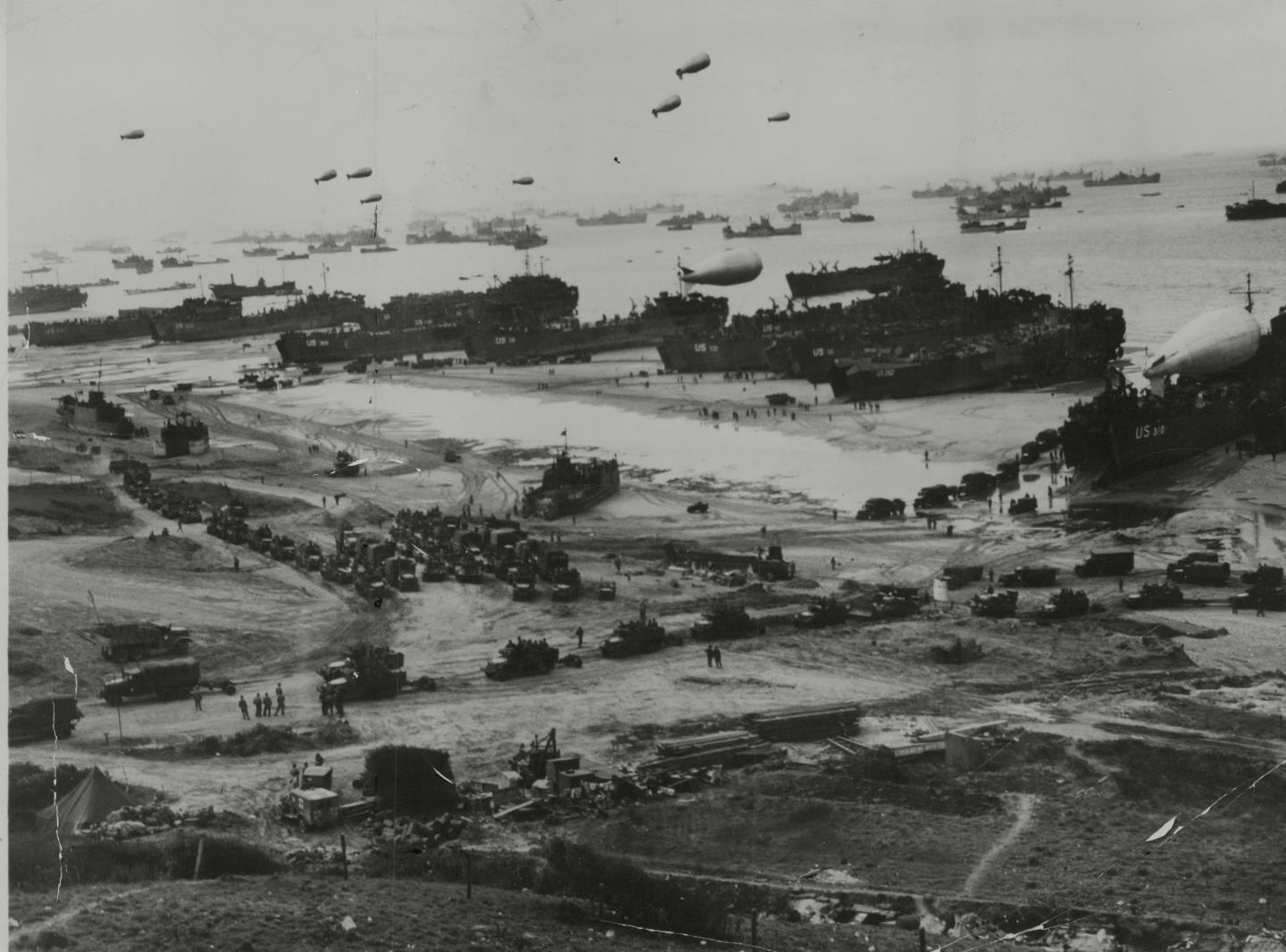 The Allied invasion of northern France, on D-Day, was codenamed Operation Overlord. The waters are packed with shipping as reinforcements and supplies are funnelled ashore for the conquest of the Cherbourg peninsula. 