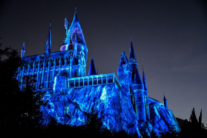 Hogwarts Castle showcased as a holiday projection show at Universal Studio's Islands of Adventure in Orlando, Florida, on December 2 2021. Picture: Joseph Prezioso/ZUMA Press Wire/Shutterstock.