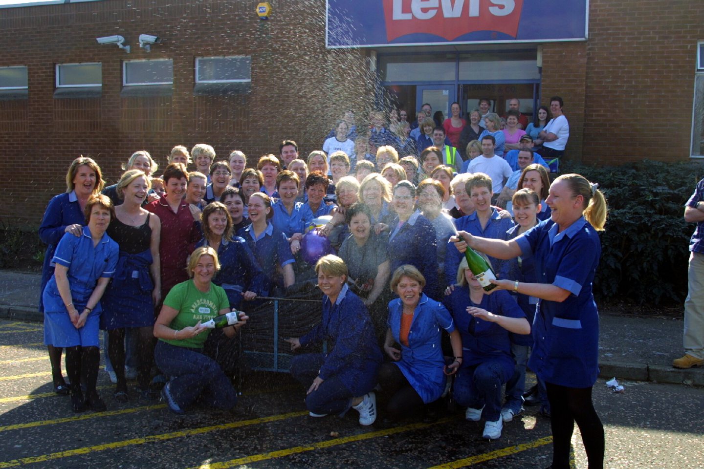 Champagne corks popped on what was the last day for the staff at the Levi's factory, Dundee.