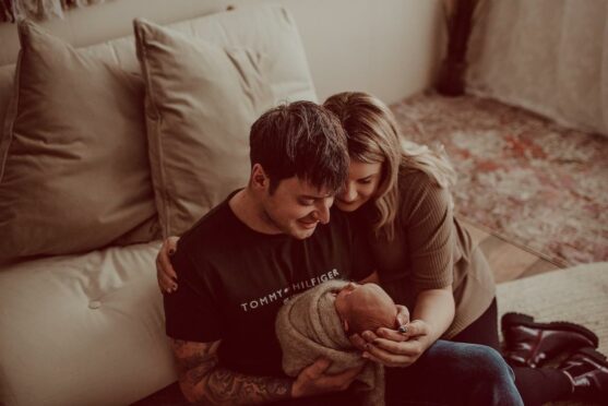 Dad Shane Slater, mum Billie Cowie, and baby Elsie