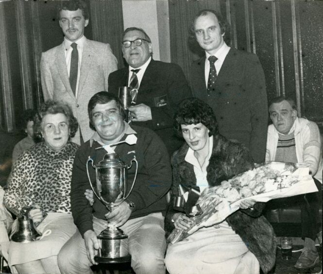 Jocky and Malvina celebrate in Kirkcaldy with the trophy following his 1982 triumph at Stoke. Picture: DCT Media.