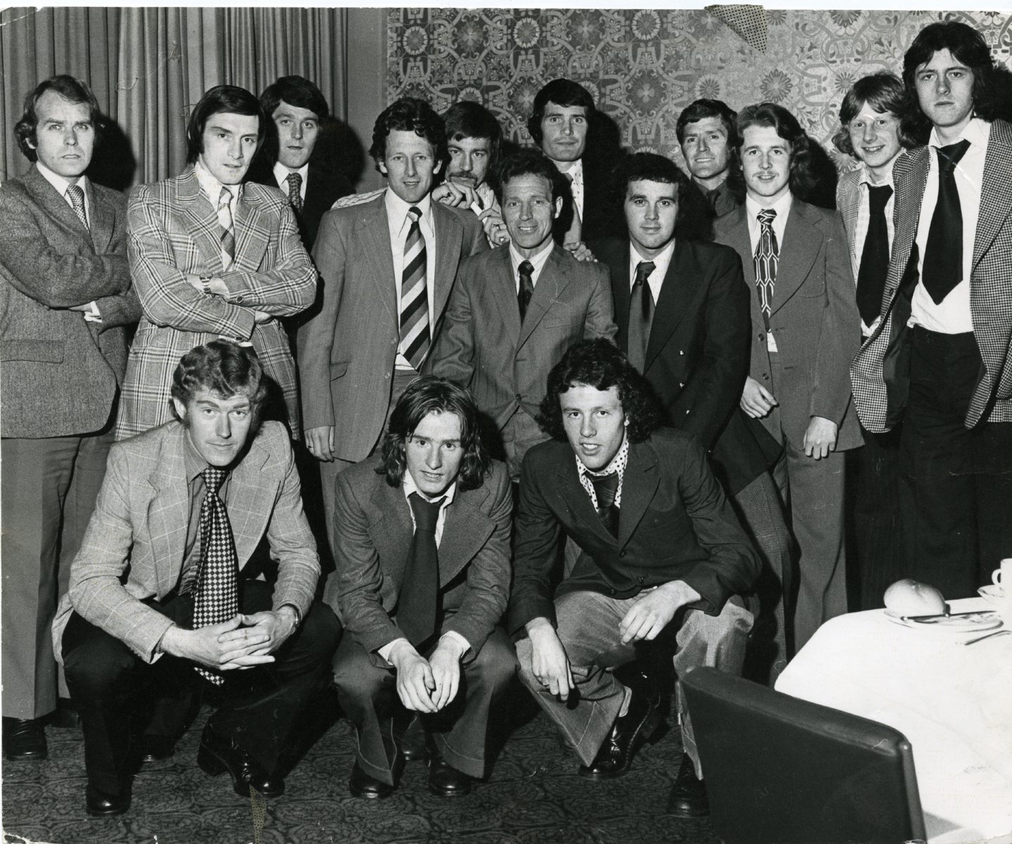 A despondent United squad line-up in the Angus Hotel following the Scottish Cup Final defeat to Celtic in 1974.
