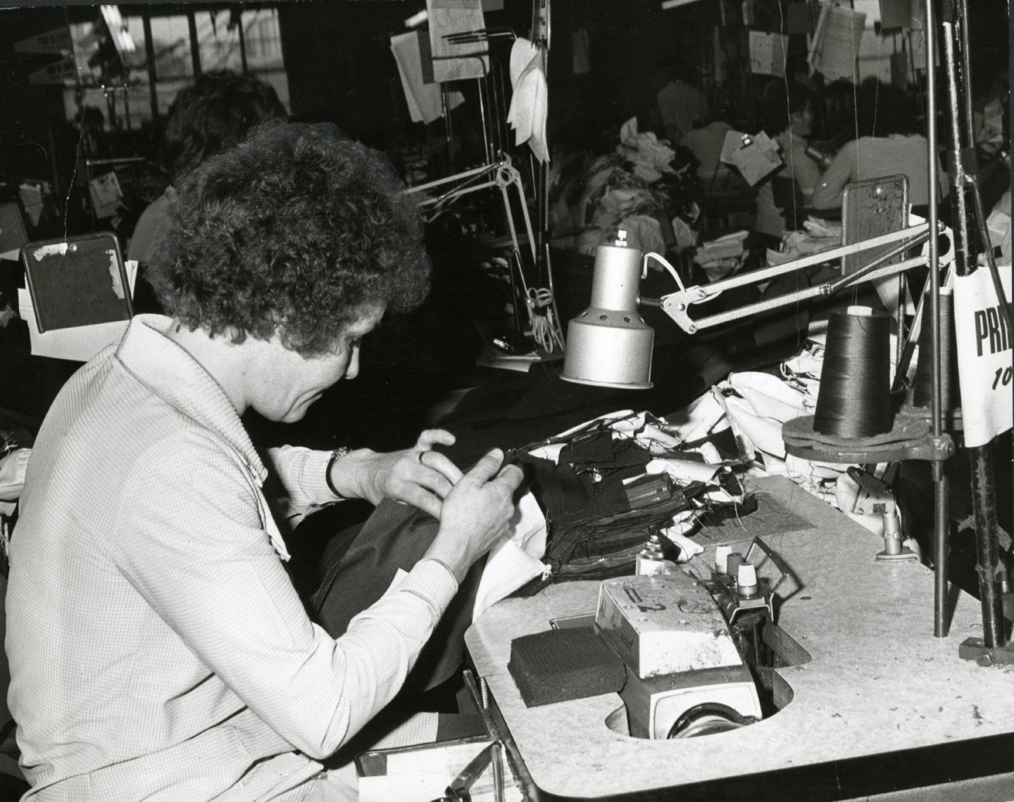 Barbara Burns at work in the Levi Strauss factory in 1979.