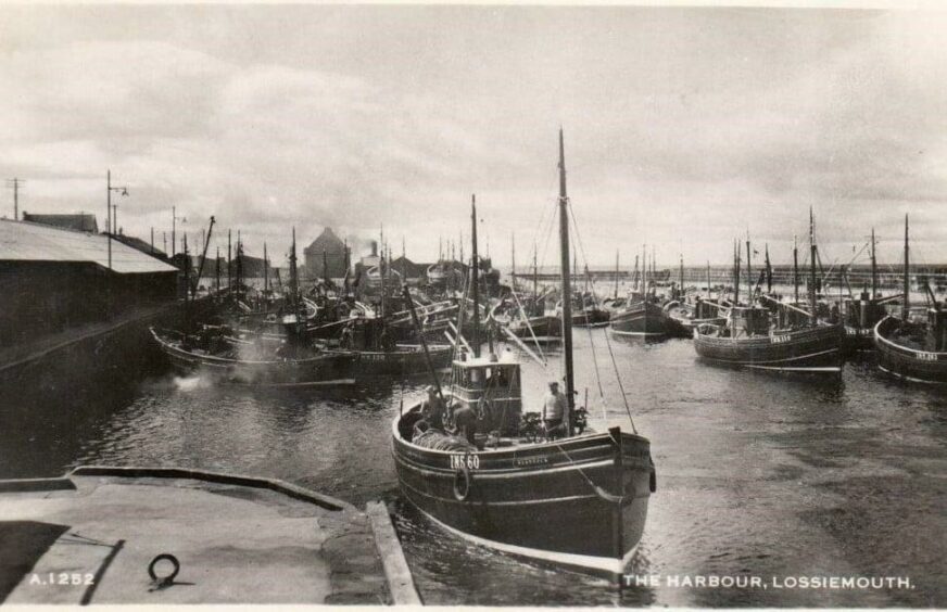 An old postcard of the once-thriving fishing industry in Lossiemouth.