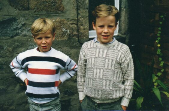 Mark Rowson, right, with brother Jonathan as children.