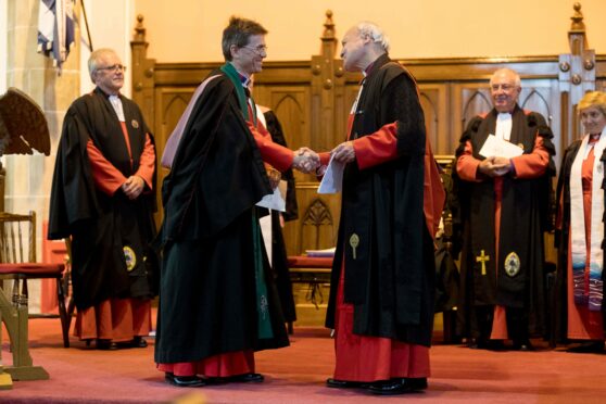 Pictured being installed as the Queen's Chaplain-in-Ordinary is Rev George Cowie.