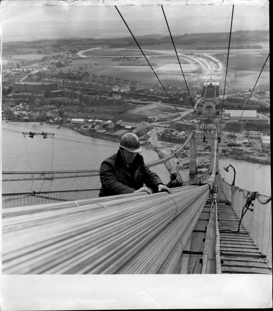 A man working at height on the Forth Road Bridge
