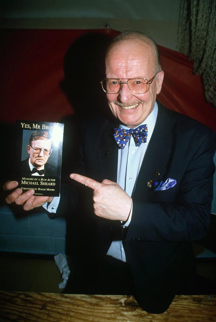 Grange Hill legend Michael Sheard shows off a copy of his memoir back in 1998. Photo: Tony Larkin/Shutterstock.