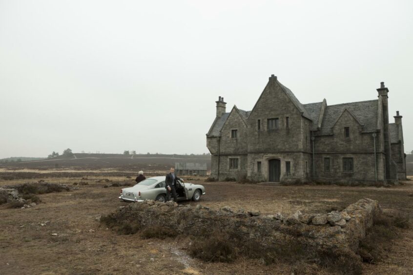 Dame Judi Dench and Daniel Craig explore James Bond's Scottish roots on the set of Skyfall house. 