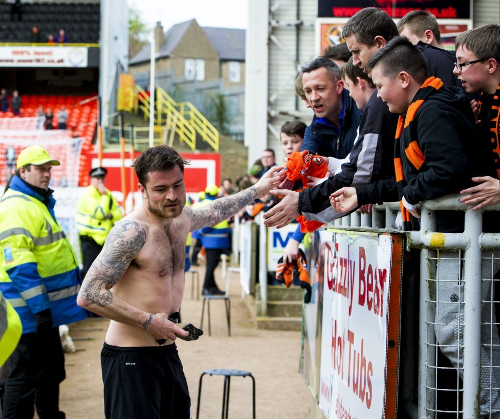 Paul Paton gave his top to one of United's long-suffering fans at full-time.