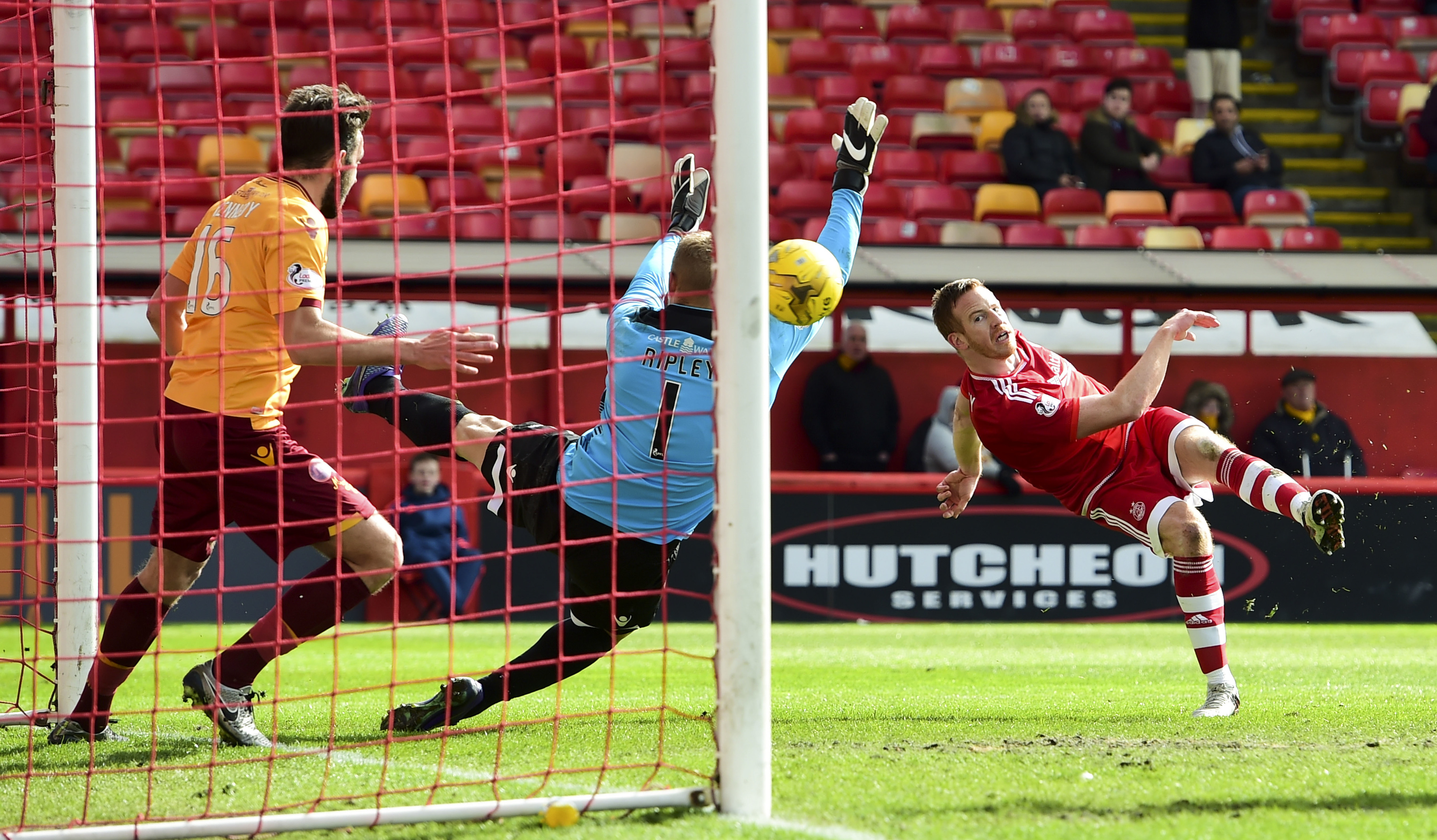 Aberdeen's Adam Rooney (right) fires in the third goal.