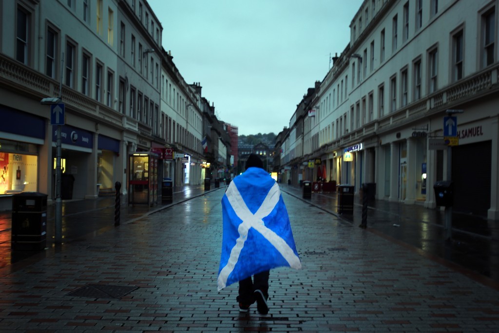 A dejected independence supporter heads home in Dundee after the last referendum.