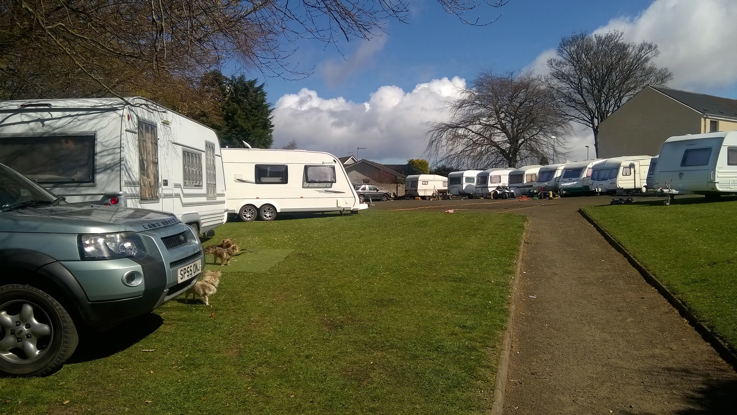 The caravans and vehicles at the end of the lane between Westfield Drive and Threewells Drive.