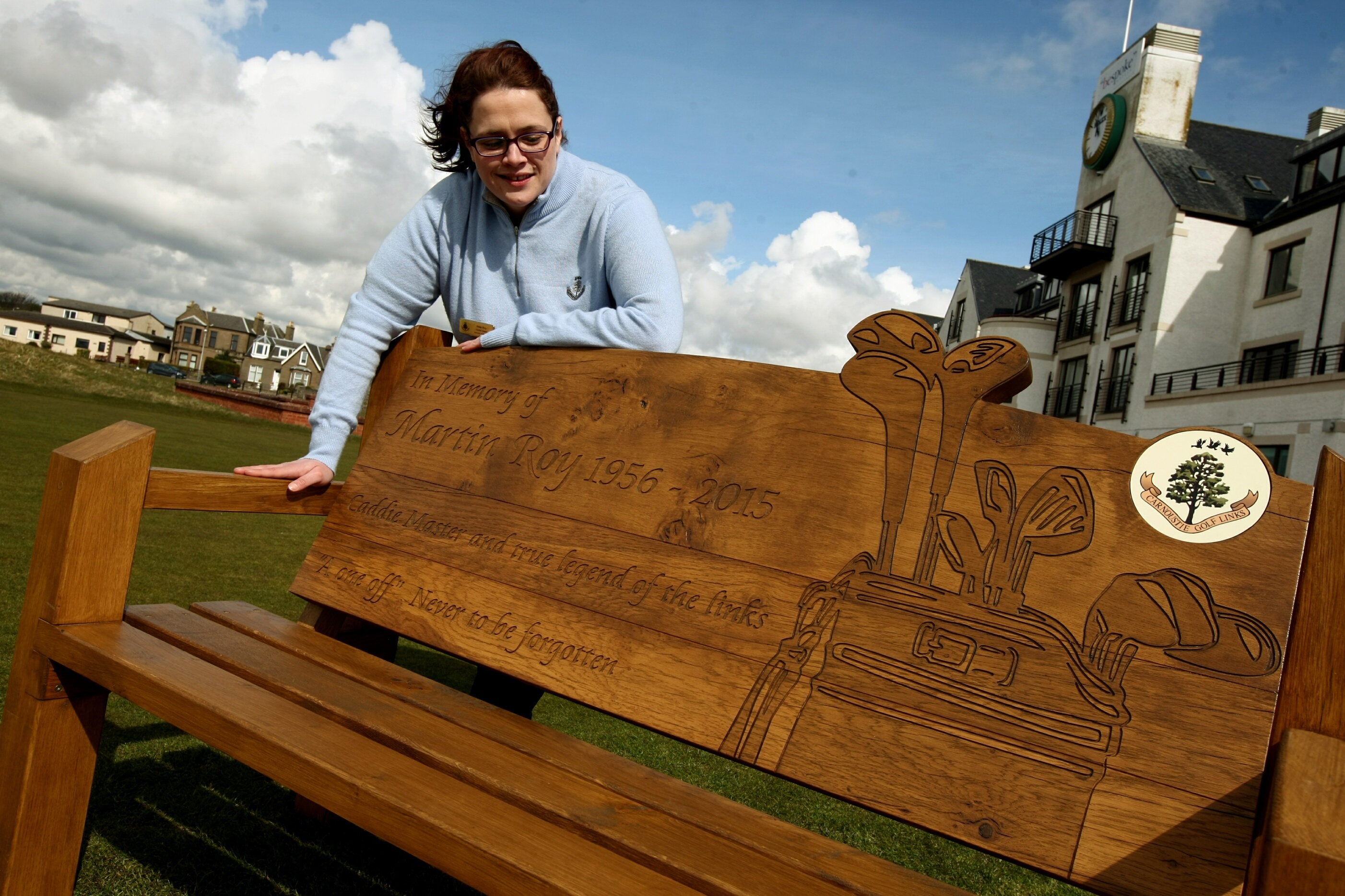 Ailsa Roy, daughter of caddie legend Martin, at the memorial bench.