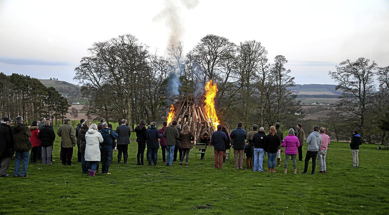 Celebrations marked the Queen's 90th Birthday at Carse Gray, Forfar, organised by James and Melissa Gray-Cheape. 
Around 100 people attended and were given wine and eats.
The Lord Lieutenant, Georgiana Osborne, read a message from Prince Charles and then lit the beacon.