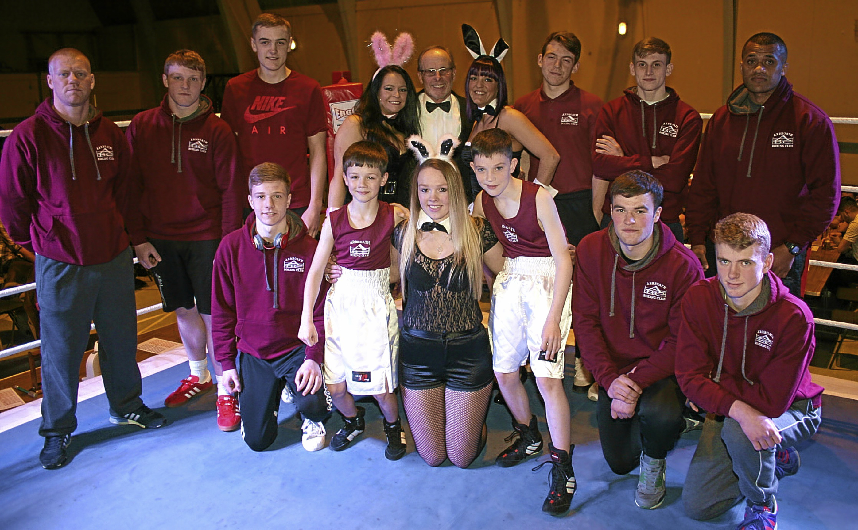 The Arbroath boxers who took part with ring girl Louise Berrie at the front.