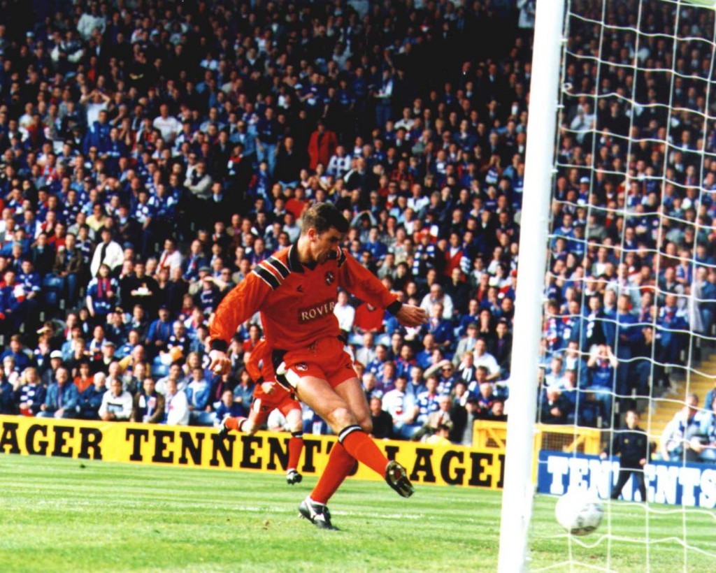 Craig Brewster slots the ball into the net to score the winning goal for Dundee United in the 1994 Scottish Cup final