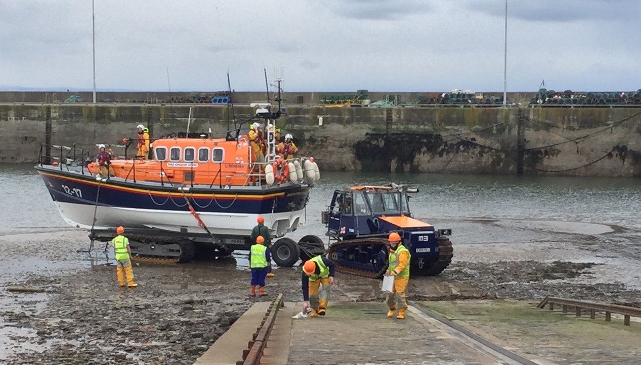 The Anstruther RNLI lifeboat crew in action at a low water launch.